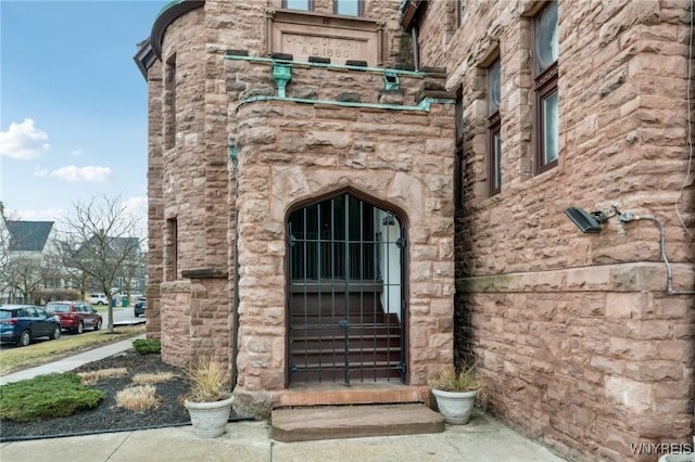 231 Richmond Ave Unit 4, Buffalo, NY 14222 - doorway to property featuring stone siding