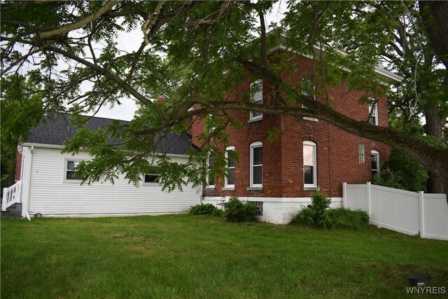 4571 Budd Rd, Cambria, NY 14094 - view of property exterior with brick siding