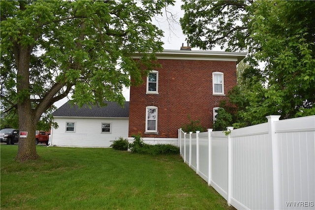 4571 Budd Rd, Cambria, NY 14094 - view of home's exterior with brick siding