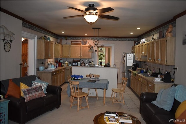 4571 Budd Rd, Cambria, NY 14094 - kitchen with ceiling fan, backsplash, light countertops, a sink, and freestanding refrigerator