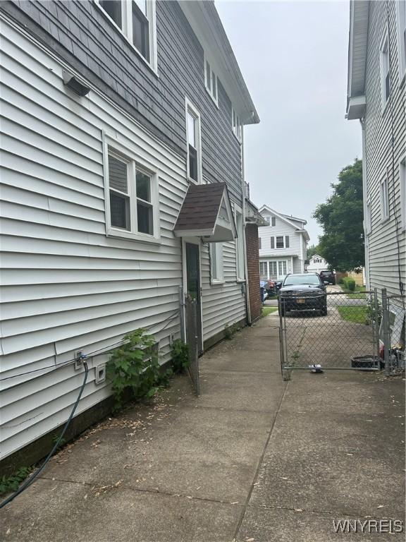 89 Rutland St, Buffalo, NY 14220 - view of home's exterior featuring concrete driveway