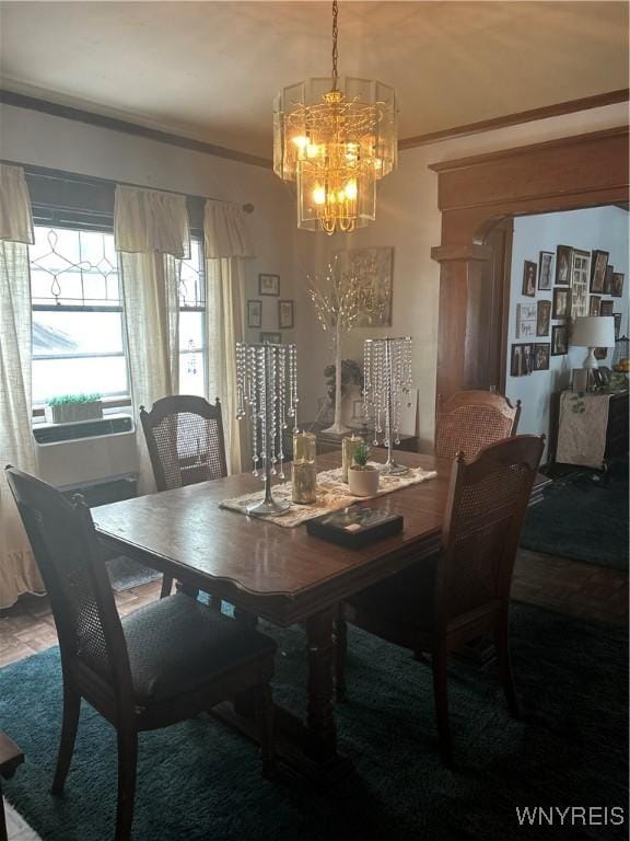 89 Rutland St, Buffalo, NY 14220 - dining space featuring a chandelier and crown molding