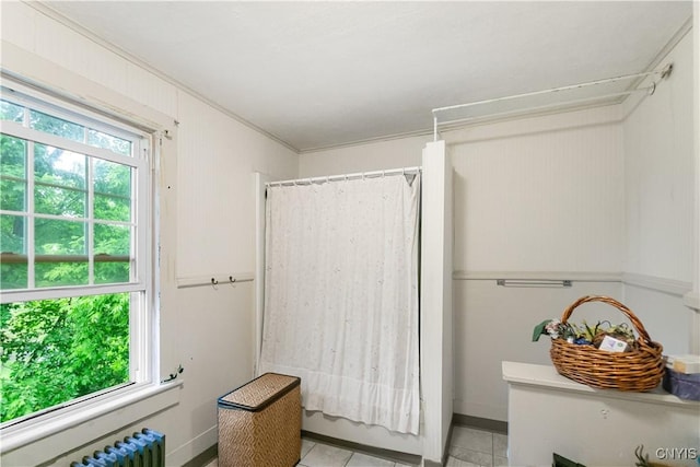 4937 W Seneca, Onondaga, NY 13215 - full bath featuring plenty of natural light, tile patterned floors, radiator, crown molding, and baseboards