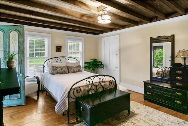 4937 W Seneca, Onondaga, NY 13215 - bedroom with beamed ceiling, wood finished floors, and baseboards