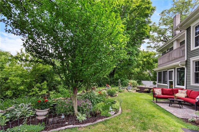 4937 W Seneca, Onondaga, NY 13215 - view of green lawn featuring outdoor lounge area, a balcony, and a patio area