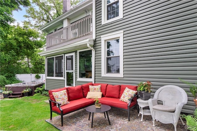 4937 W Seneca, Onondaga, NY 13215 - view of patio / terrace with a hot tub, a balcony, outdoor lounge area, and a sunroom
