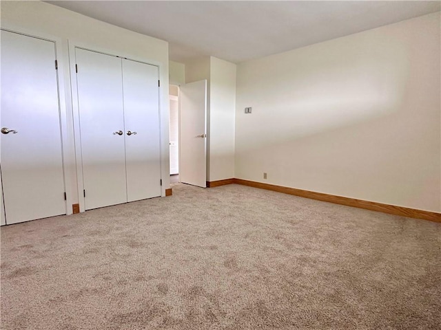 2501 E Ave, Brighton, NY 14610 - unfurnished bedroom with carpet and baseboards