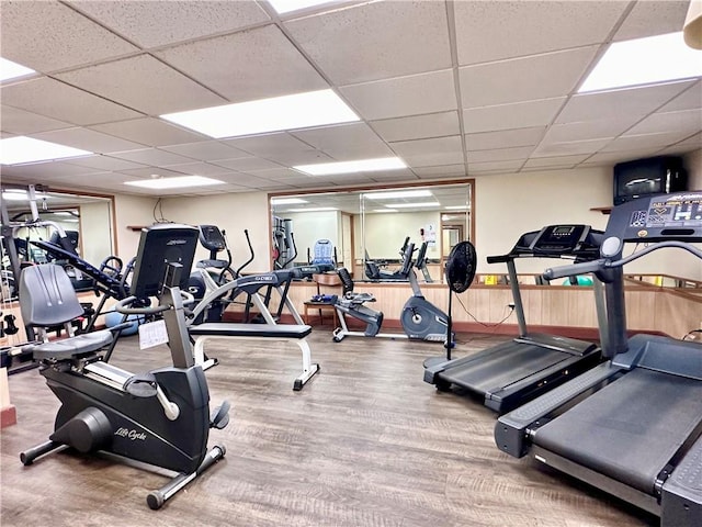 2501 E Ave, Brighton, NY 14610 - exercise room featuring wood finished floors and a drop ceiling