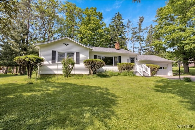 1701 Billington Rd, Elma, NY 14052 - view of front of property with a chimney, a front yard, and a garage