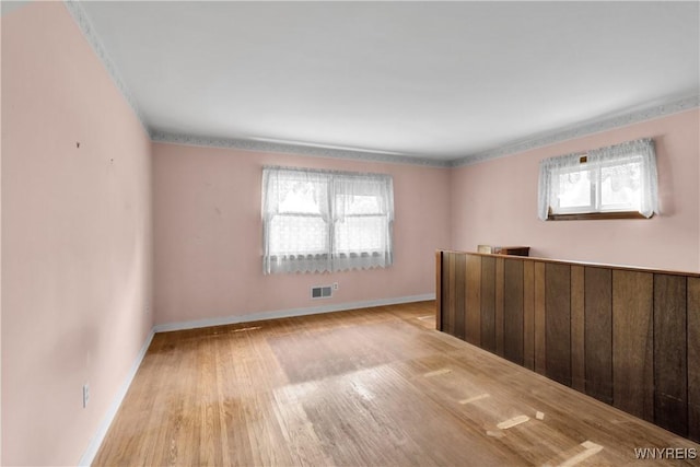 1701 Billington Rd, Elma, NY 14052 - unfurnished room with plenty of natural light, wood finished floors, and baseboards