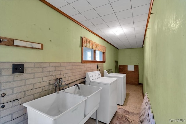 1701 Billington Rd, Elma, NY 14052 - washroom with washer and clothes dryer and a wainscoted wall