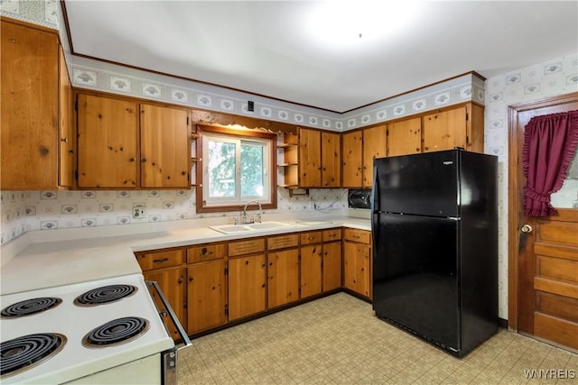 1701 Billington Rd, Elma, NY 14052 - kitchen featuring black appliances, a sink, wallpapered walls, light flooring, and light countertops
