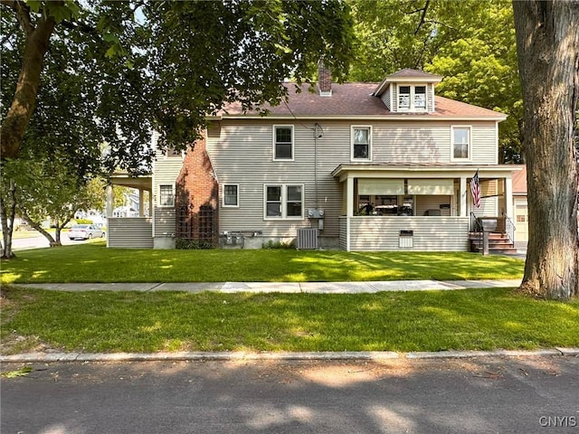 700 Elm St, Rome-Inside, NY 13440 - rear view of property featuring a lawn, a chimney, and cooling unit