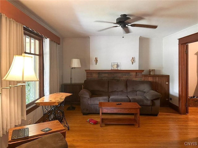 700 Elm St, Rome-Inside, NY 13440 - living area with ceiling fan, wood finished floors, and ornamental molding