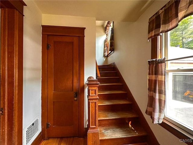 700 Elm St, Rome-Inside, NY 13440 - staircase with wood finished floors