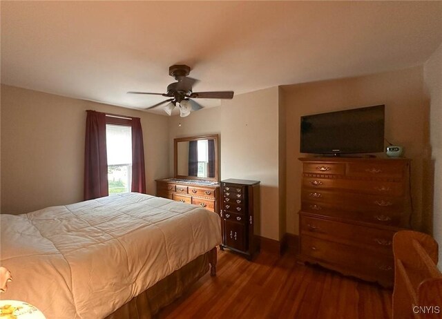 700 Elm St, Rome-Inside, NY 13440 - bedroom featuring dark wood-style flooring and ceiling fan