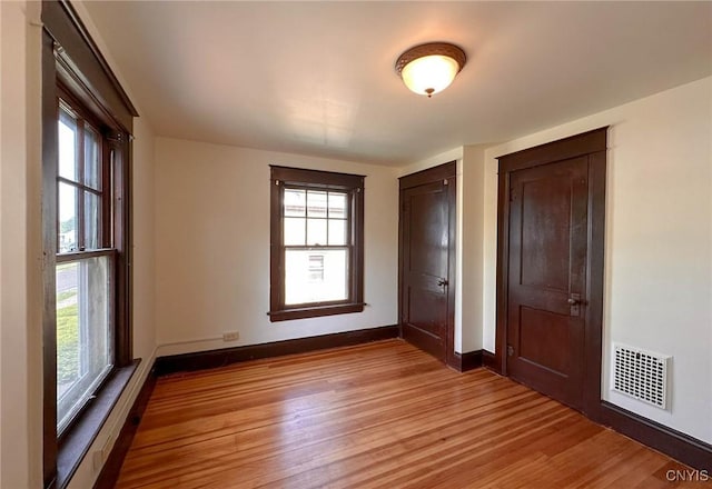 700 Elm St, Rome-Inside, NY 13440 - unfurnished bedroom featuring light wood-style floors and baseboards