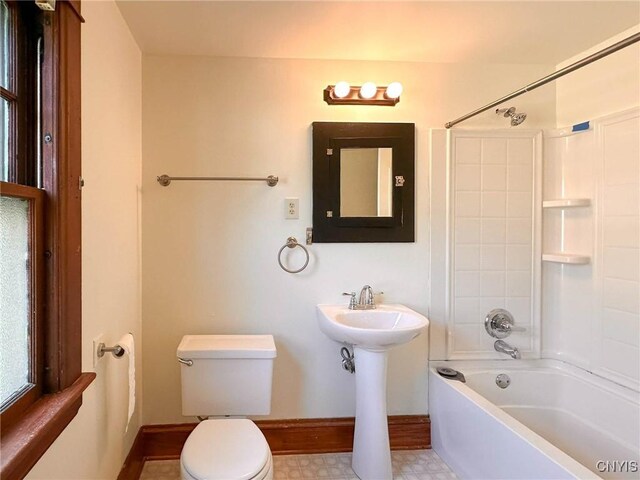700 Elm St, Rome-Inside, NY 13440 - full bath with toilet, washtub / shower combination, and baseboards