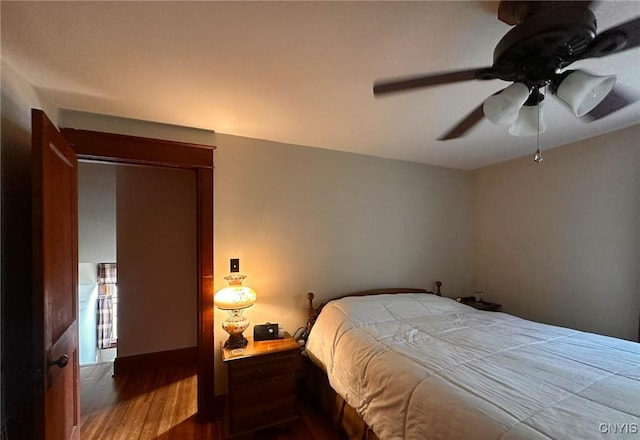 700 Elm St, Rome-Inside, NY 13440 - bedroom with wood finished floors and a ceiling fan