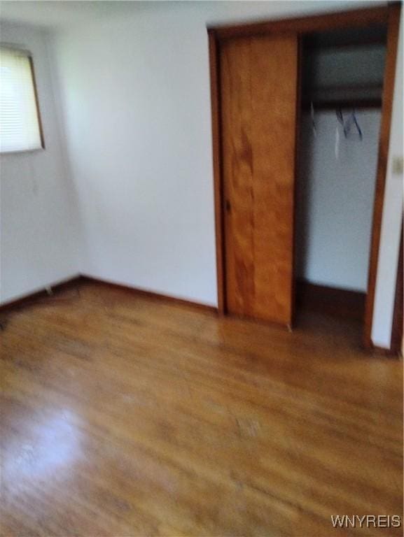 72 Nicholson St, Buffalo, NY 14214 - unfurnished bedroom featuring light wood-style floors and a closet