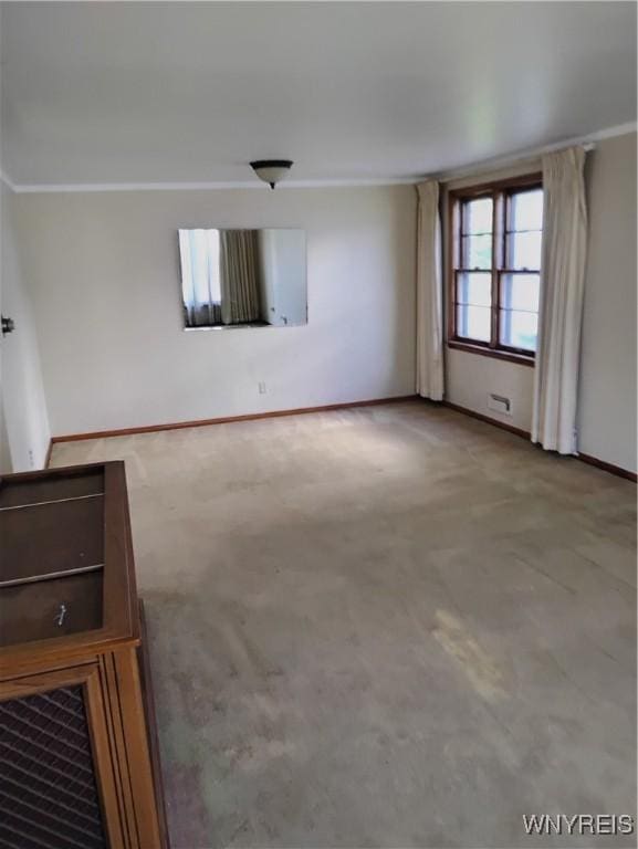 72 Nicholson St, Buffalo, NY 14214 - unfurnished living room featuring baseboards and carpet floors
