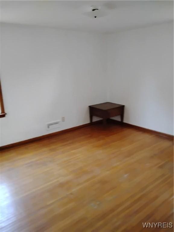 72 Nicholson St, Buffalo, NY 14214 - spare room with light wood-type flooring and baseboards