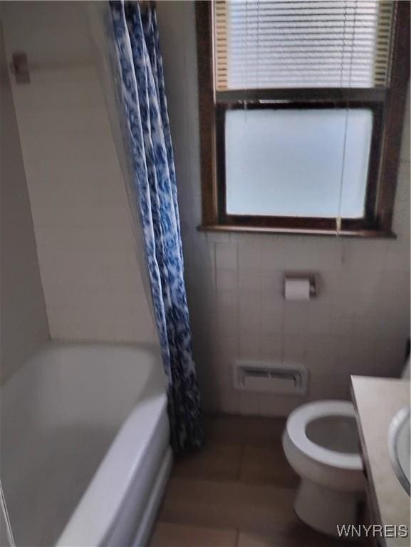 72 Nicholson St, Buffalo, NY 14214 - bathroom featuring vanity and shower / tub combo with curtain