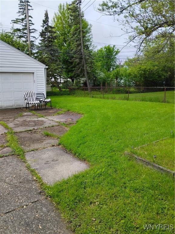 72 Nicholson St, Buffalo, NY 14214 - view of yard featuring an outbuilding and a garage