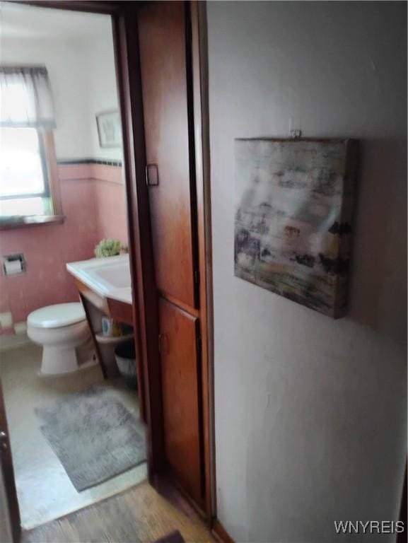 72 Nicholson St, Buffalo, NY 14214 - bathroom with toilet and wood finished floors