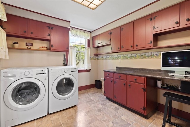 707 Hubbell Rd, Ogden, NY 14428 - laundry room featuring washer and dryer, cabinet space, baseboards, and a desk