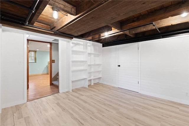 707 Hubbell Rd, Ogden, NY 14428 - finished basement featuring wood finished floors and baseboards