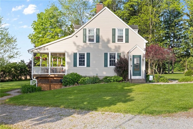 707 Hubbell Rd, Ogden, NY 14428 - view of front of house featuring a chimney and a front lawn