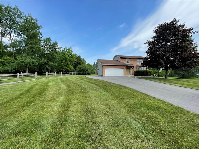 235 Briarwood Ln, Wheatland, NY 14546 - view of front of home with a garage