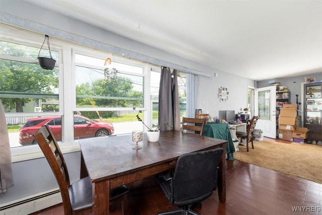 596 Longmeadow Rd, Amherst, NY 14226 - dining space with a baseboard heating unit, wood finished floors, and a desk