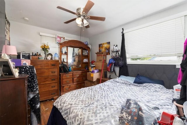 596 Longmeadow Rd, Amherst, NY 14226 - bedroom with wood finished floors and a ceiling fan