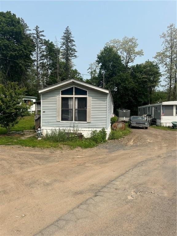 28 Main St, Unadilla, NY 13849 - view of side of home featuring driveway