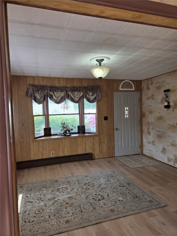 30 Park Ave, Eldred, PA 16731 - entrance foyer with plenty of natural light, wood finished floors, baseboards, and baseboard heating