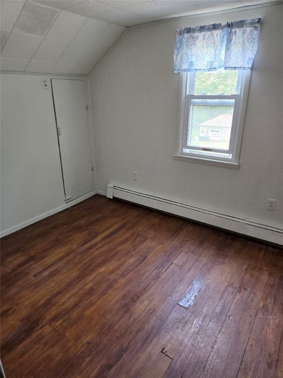 30 Park Ave, Eldred, PA 16731 - bonus room featuring dark wood-type flooring, baseboard heating, and lofted ceiling