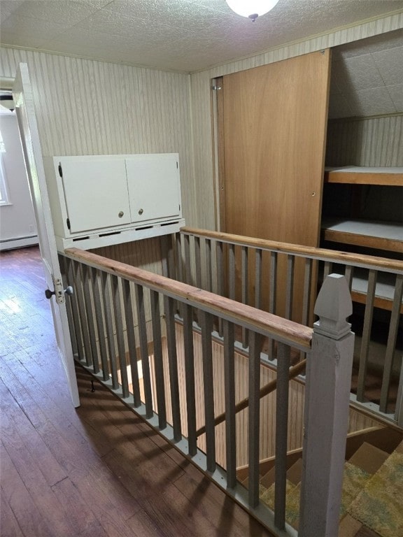 30 Park Ave, Eldred, PA 16731 - staircase featuring hardwood / wood-style floors and a textured ceiling