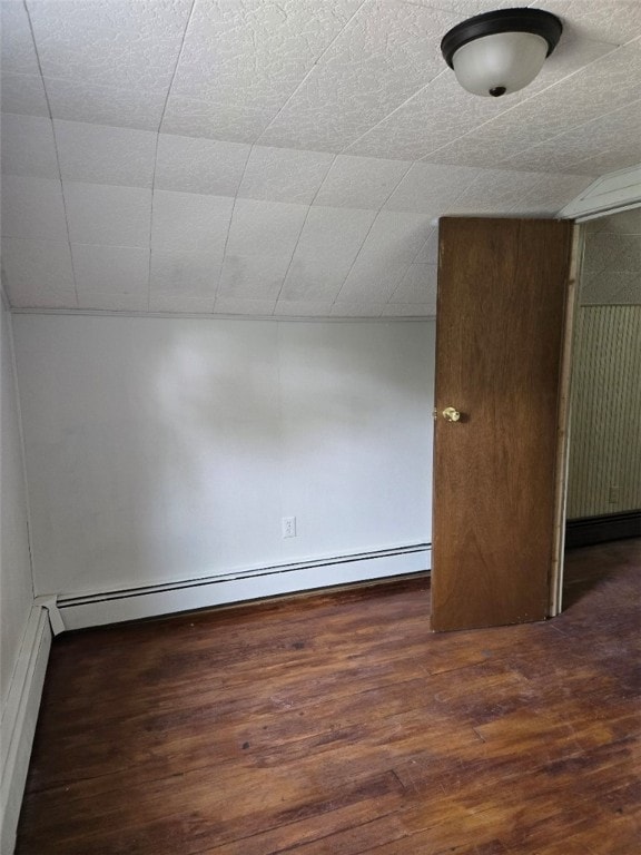 30 Park Ave, Eldred, PA 16731 - unfurnished bedroom with wood finished floors and baseboard heating