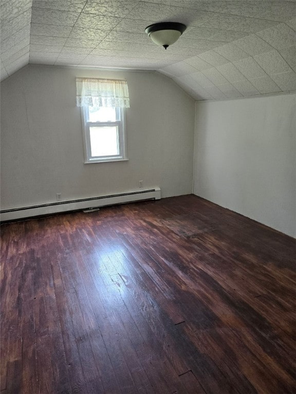 30 Park Ave, Eldred, PA 16731 - additional living space featuring baseboard heating, vaulted ceiling, and hardwood / wood-style floors