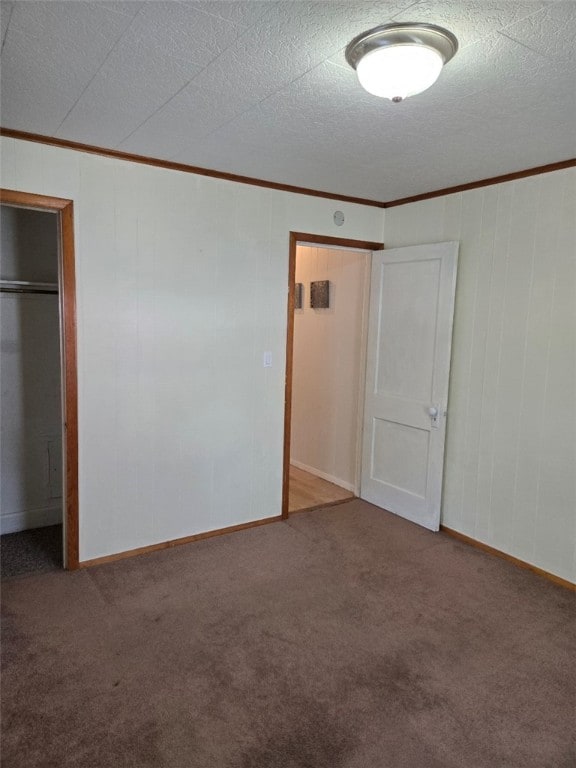 30 Park Ave, Eldred, PA 16731 - unfurnished bedroom featuring crown molding, carpet floors, a closet, and baseboards