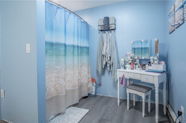 18916 State Route 3, Hounsfield, NY 13601 - bathroom featuring wood finished floors and curtained shower