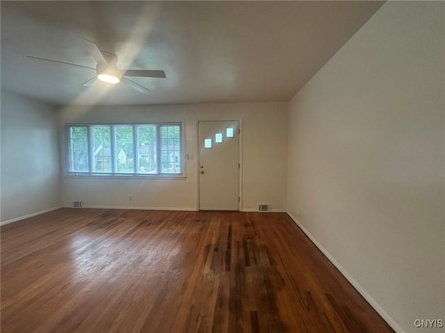 719 Dawes Ave, Utica, NY 13502 - entryway with wood finished floors and baseboards