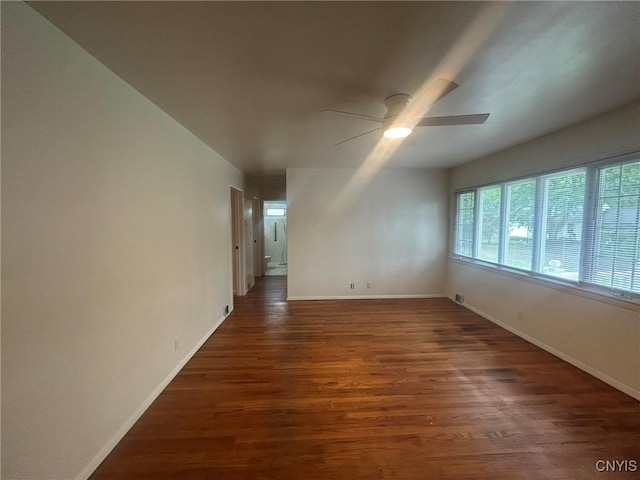 719 Dawes Ave, Utica, NY 13502 - spare room featuring ceiling fan, wood finished floors, and baseboards