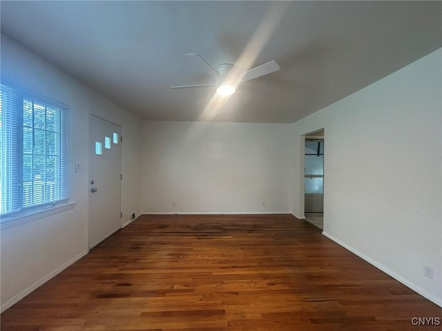 719 Dawes Ave, Utica, NY 13502 - empty room with ceiling fan, wood finished floors, and baseboards