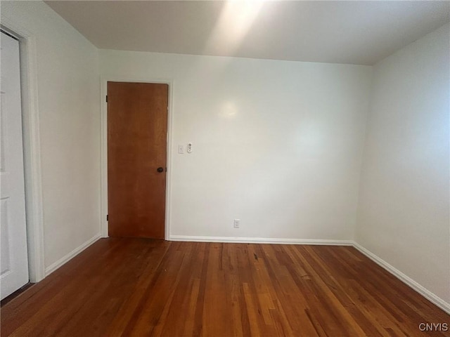 719 Dawes Ave, Utica, NY 13502 - unfurnished room featuring wood finished floors and baseboards
