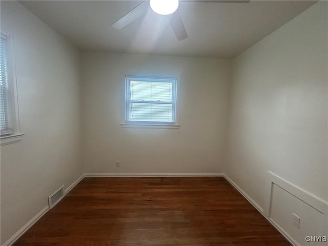 719 Dawes Ave, Utica, NY 13502 - spare room with a ceiling fan, wood finished floors, and baseboards
