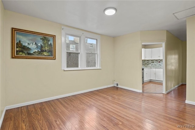 159 Kilhoffer St, Buffalo, NY 14211 - unfurnished living room featuring light wood-style floors and baseboards