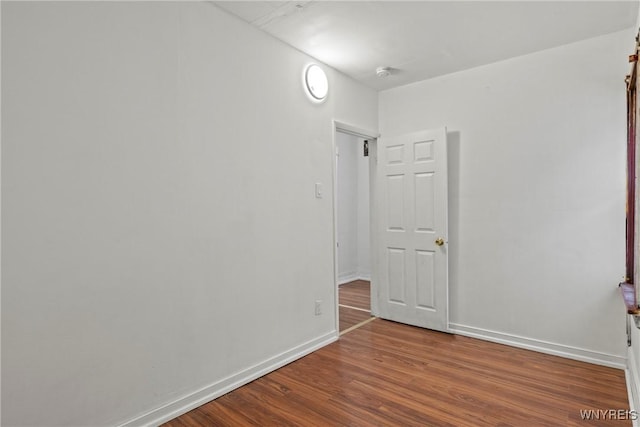 159 Kilhoffer St, Buffalo, NY 14211 - spare room featuring wood finished floors, baseboards, and a smoke detector